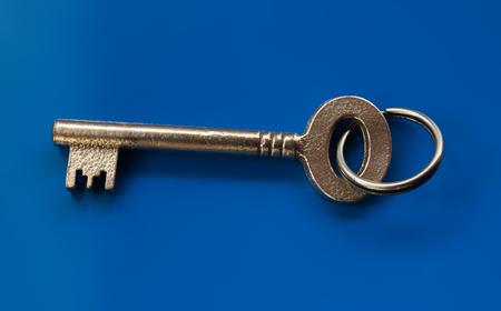 Isolated chrome key with split ring on the blue background.の写真素材