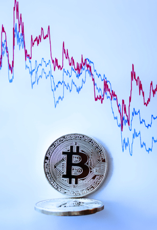 Crypto currency bitcoin coins with graphの写真素材