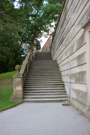 Old castle stairs, path, wall grass and treesのeditorial素材