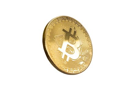 On a gray background is gold coin of a digital crypto  currency - bitcoinの写真素材