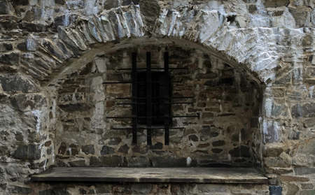 Barred window in the ruins of the stone masonry of the castle helfstynの写真素材