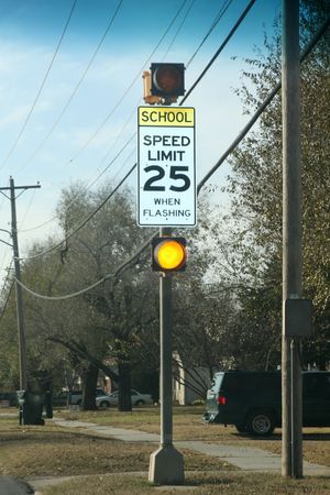 School speed limit 20 flashing sign yellow light flashing