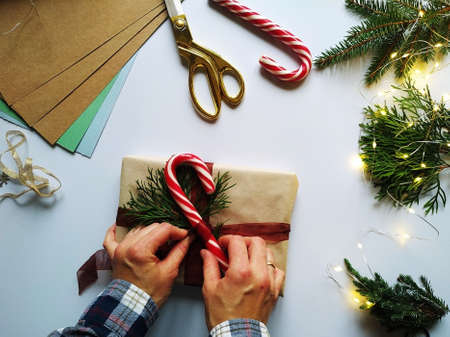 step-by-step instructions for packing a Christmas gift. DIY Christmas gift wrapping.
