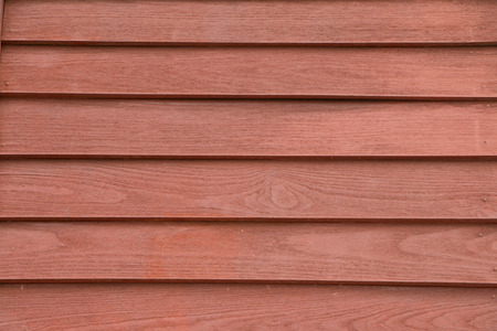This is a picture of wooden wall of a house in the old period