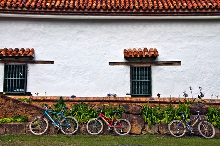Three Bicycles Resting on a Wallのeditorial素材