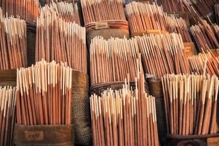 Various flavors of incense for sale の写真素材