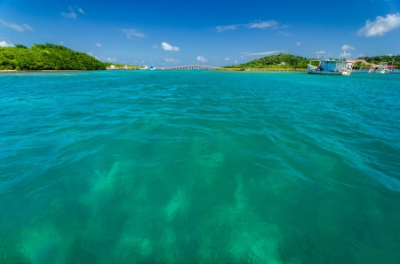 View of beautiful Caribbean water with a far away bridge in San Andres y Providencia, Colombiaの写真素材