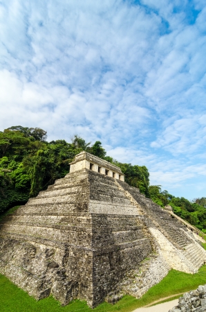 Vertical view of the Temple of Inscriptions at Palenque with a beautiful skyの写真素材