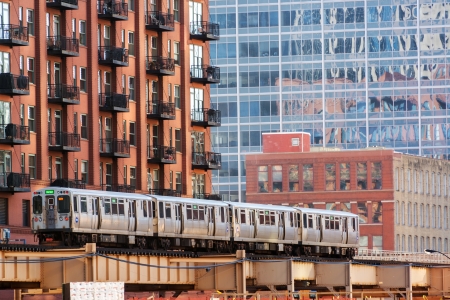 CHICAGO - DECEMBER 28  An elevated train passes through downtown Chicago on December 28, 2013のeditorial素材