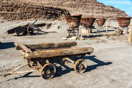 Old abandoned tools for refining saltpeter in the ghost town of Humberstone, Chileの写真素材