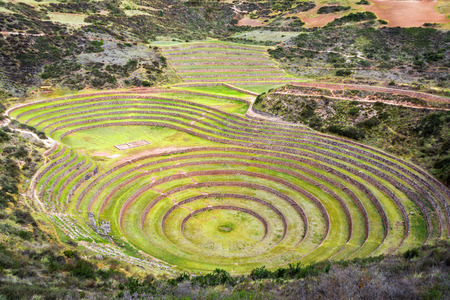 Concentric circles of the old Inca ruins of Moray in the Sacred Valley near Cusco, Peruの写真素材
