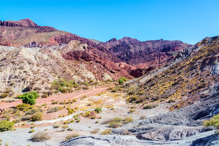 Barren red and gray desert landscape in Tupiza, Boliviaの写真素材