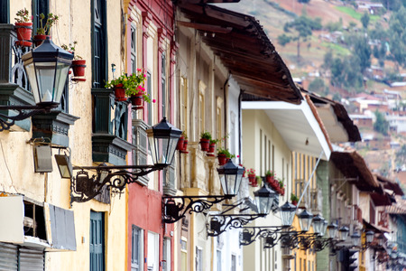 Colonial facades and rows of street lights in Cajamarca, Peruの写真素材