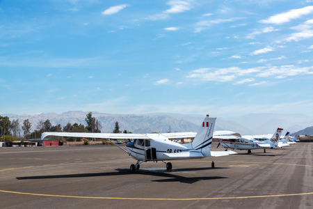 NAZCA, PERU - OCTOBER 26: Airplanes at Maria Reiche Neuman Airport in Nazca, Peru waiting to take tourists over the Nazca Lines on October 26, 2014のeditorial素材