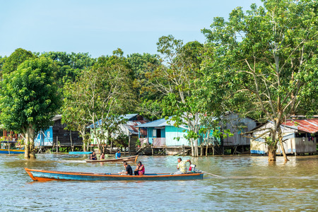 LETICIA, COLOMBIA - MARCH 24: View of boats and houses on the Amazon River in Leticia, Colombia on March 24, 2015のeditorial素材