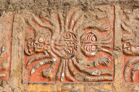 Closeup of a an ancient mural of a spider in the Huaca de la Luna in Trujillo, Peru
