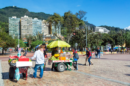 BOGOTA, COLOMBIA - APRIL 21: Vendors selling different types of fruit in downtown Bogota, Colombia on April 21, 2016のeditorial素材