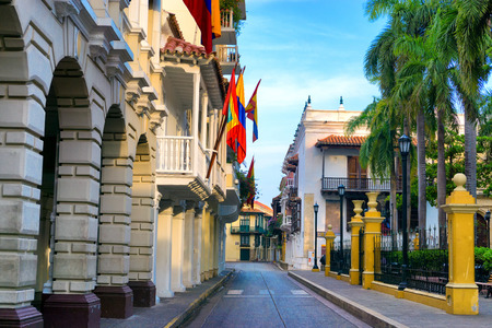 Early morning view of a street passing next to Bolivar Plaza in Cartagena, Colombiaの写真素材