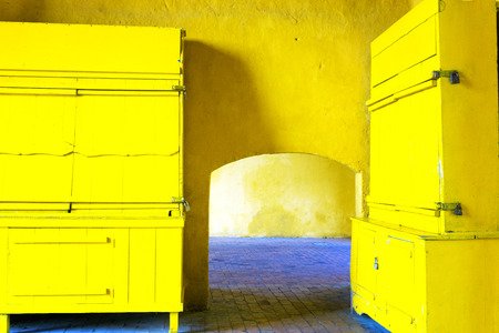 Yellow walls in the main entrance to the historic walled city of Cartagena, Colombiaの写真素材