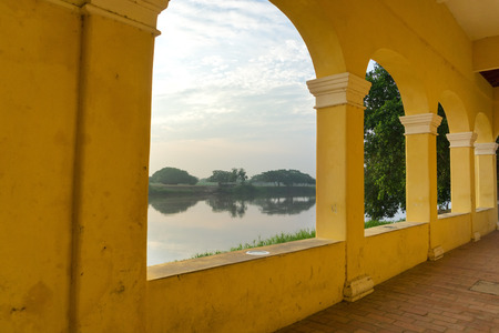Yellow arches and the Magdalena River in historic colonial Mompox, Colombia
