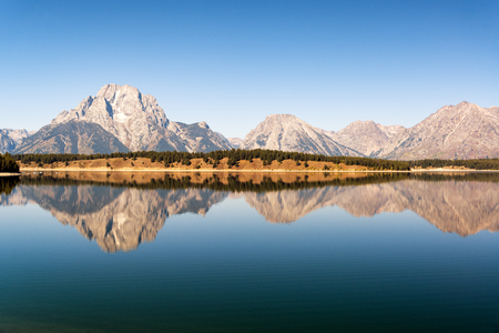 Beautiful reflection of the Teton Range in Grand Teton National Parkの写真素材