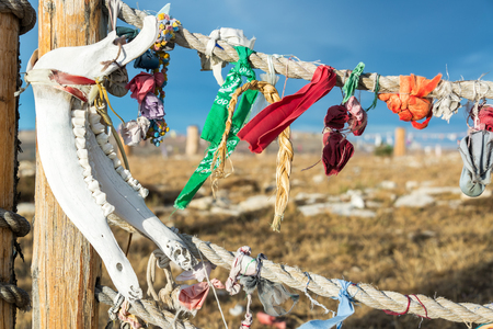 Jawbone and colorful cloth at Medicine Wheel National Historic Landmark in Wyomingの写真素材