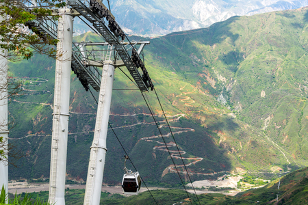 Aerial tram with a view of Chicamocha Canyon in Santander, Colombia in the backgroundのeditorial素材
