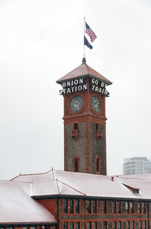 Snow falling on the train station in Portland, Oregonの写真素材