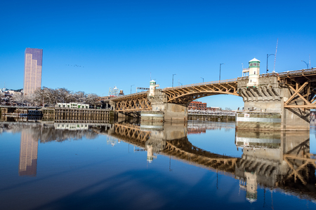 Burnside bridge beautifully reflected in the Willamette River in Portland, Oregonのeditorial素材