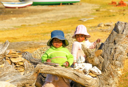 ISLA DEL SOL, BOLIVIA - AUGUST 18: Two small indigenous children on Isla del Sol, Bolivia on August 18, 2014のeditorial素材