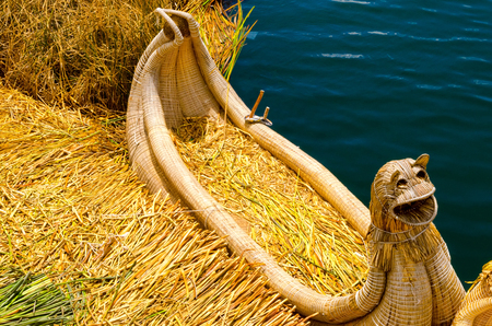Boat made of reeds on the Uros Floating Islands in Peruの写真素材