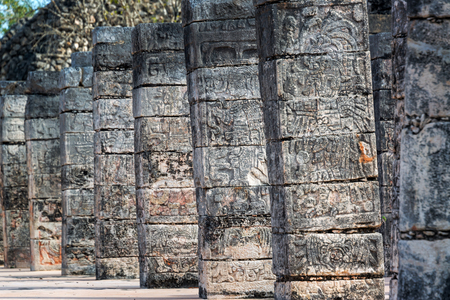 Details of ornate columns in the ruins of Chichen Itza, Mexicoの写真素材