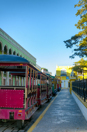 View of tourist trolley in main square in Campeche, Mexicoのeditorial素材