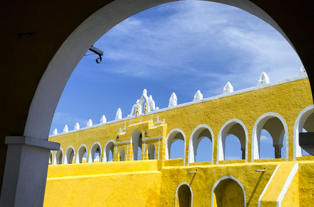 View of the entrance with arches of the monastery in Izamal, Mexicoの写真素材