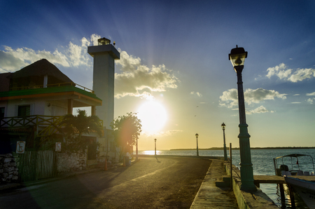 View of sunset on the waterfront in Rio Lagartos in Mexicoの写真素材