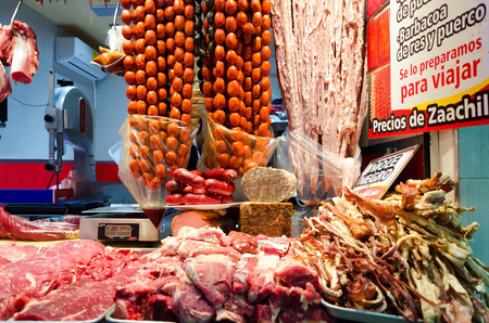 OAXACA, MEXICO - MARCH 5: Sale of sausage and meat in a marketplace in downtown Oaxaca, Mexico on March 5, 2017のeditorial素材