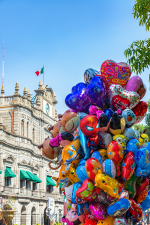 PUEBLA, MEXICO - MARCH 1: Balloons for sale in front of the mayor's office in Puebla, Mexico on March 1, 2017のeditorial素材