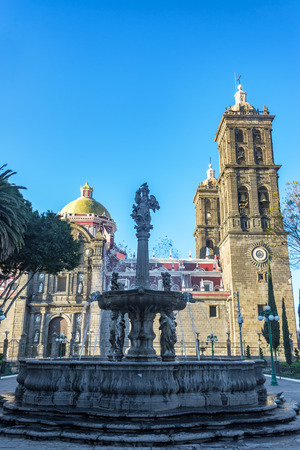 Ornate fountain the Zocalo next to the cathedral in Puebla, Mexicoのeditorial素材