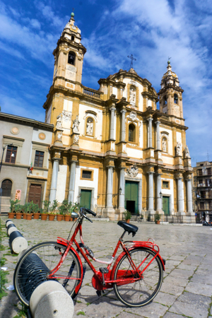 View of the Saint Domenico church and bicycle in the historic center of the San Domenico square in Palermo, Italy.のeditorial素材