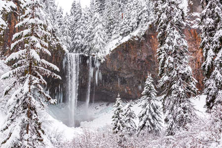 Stunning view of Tamanawas Falls on Mt. Hood in winter near Hood River, Oregonの写真素材