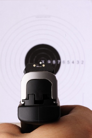 Close up isolated image of target practice.  Focuse on pistol.の写真素材