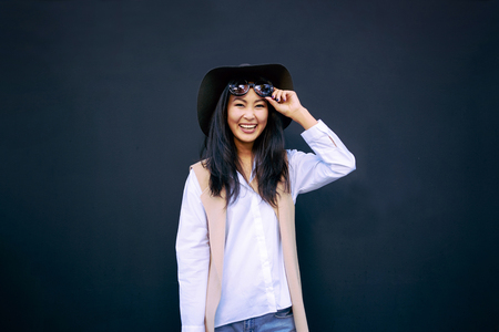 Beauty portrait of beautiful female model isolated on black background with copy space for your text or design.の写真素材