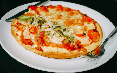 pizza on a plateの写真素材