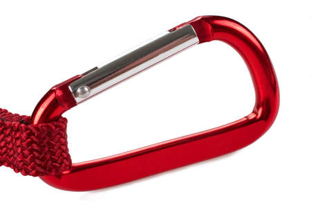 A red aluminum fashion karabiner with red woven strap attachedの写真素材