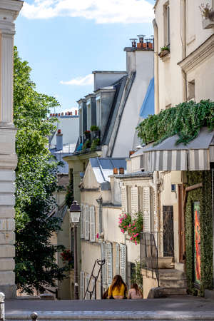 Paris, France - May 20, 2020: Typical stairs and Haussmann buildings in Montmartre in Parisのeditorial素材