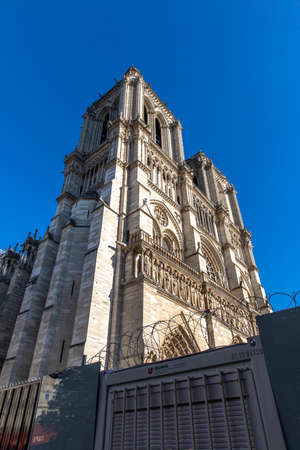 Paris, France - June 1, 2020: Beautiful view of the Notre-Dame Cathedral with a faint moon above it in Parisのeditorial素材