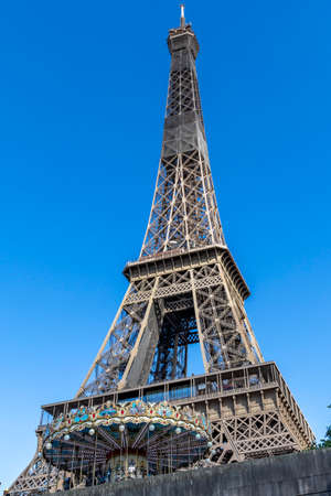 Paris, France - May 23, 2020: Vintage carousel close to Eiffel Tower in Parisのeditorial素材