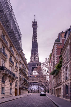 Paris, France - January 20, 2021: A back alley in Paris showcasing the architecture of the buildings...