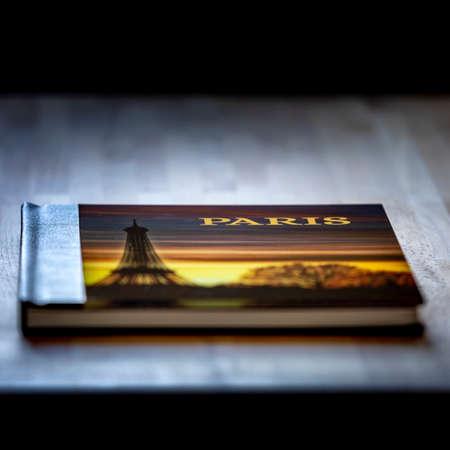 Paris, France - February 4, 2021: A nice book with many pictures of Paris, Franceのeditorial素材