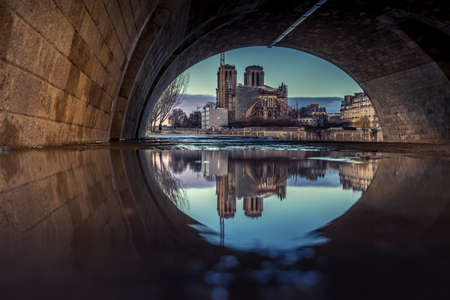 Paris, France - February 18, 2021: View of Paris flood as river Seine rises and approaches record level. Notre Dame cathedral in backgroundのeditorial素材